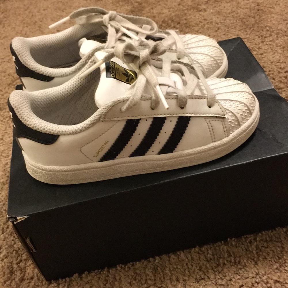 White and black adidas shoes 👟